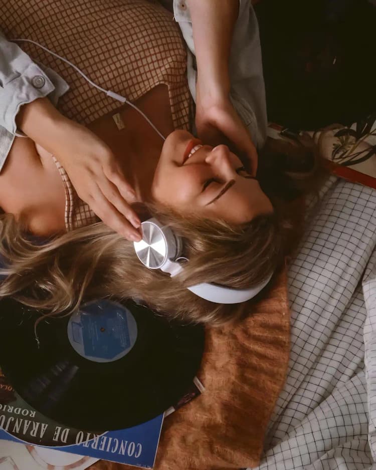 Woman listening to music with headphones